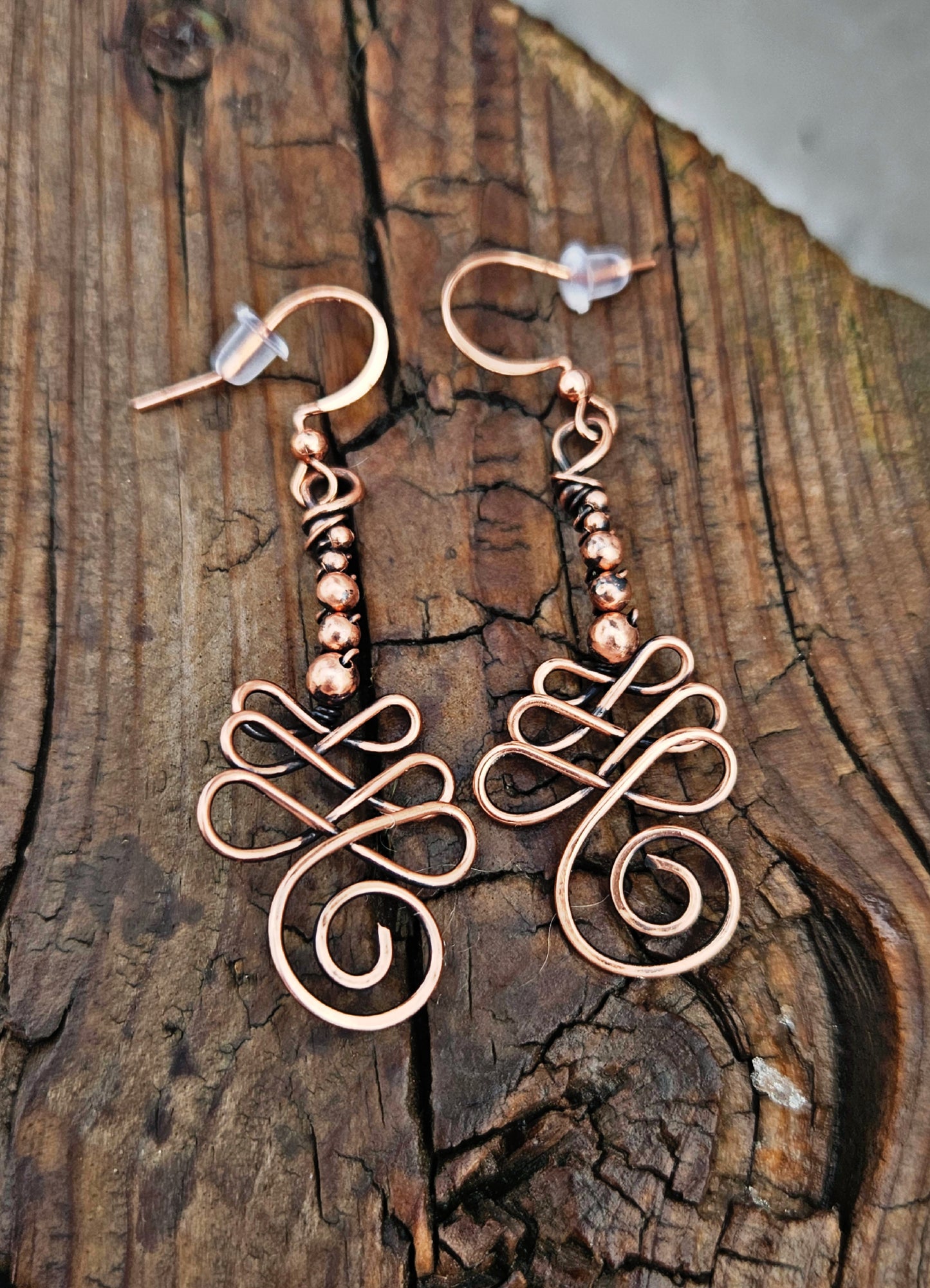 Copper swirly bead earrings
