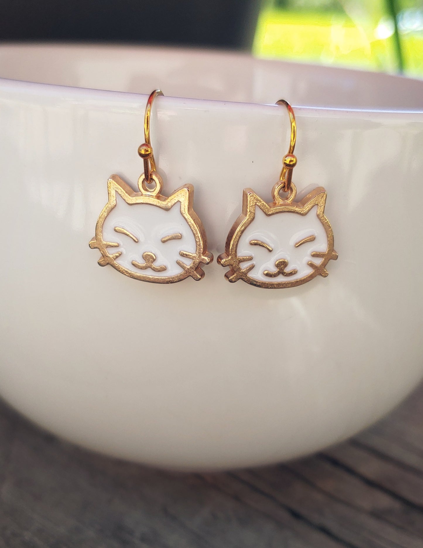 Gold cat earrings