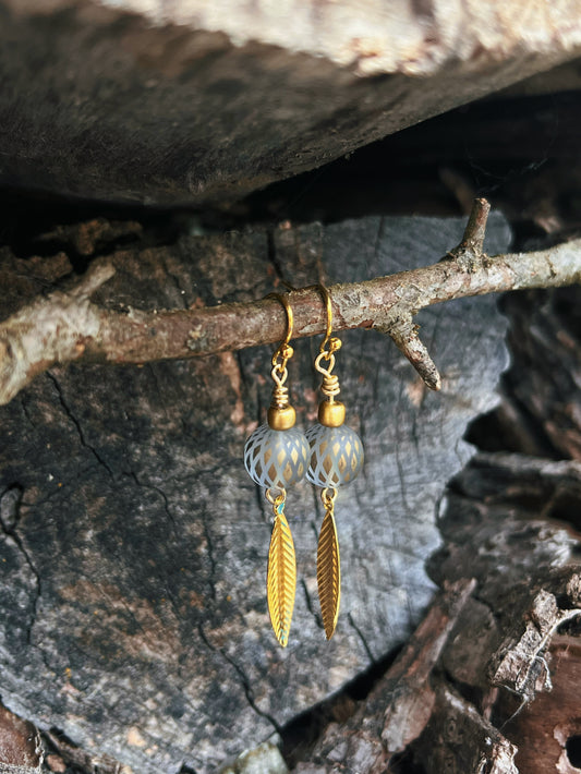 Gold feather earrings