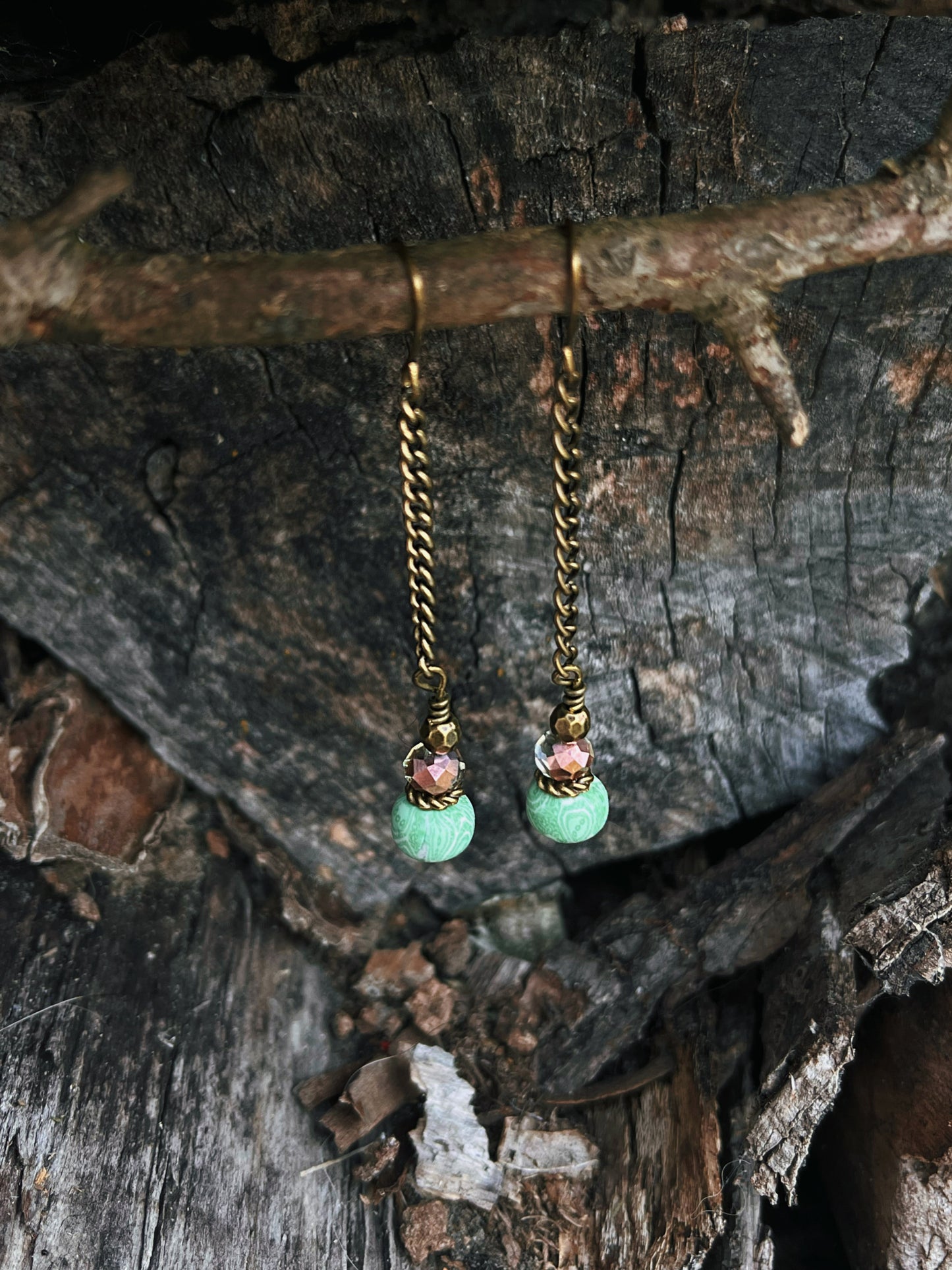 Green dangle earrings