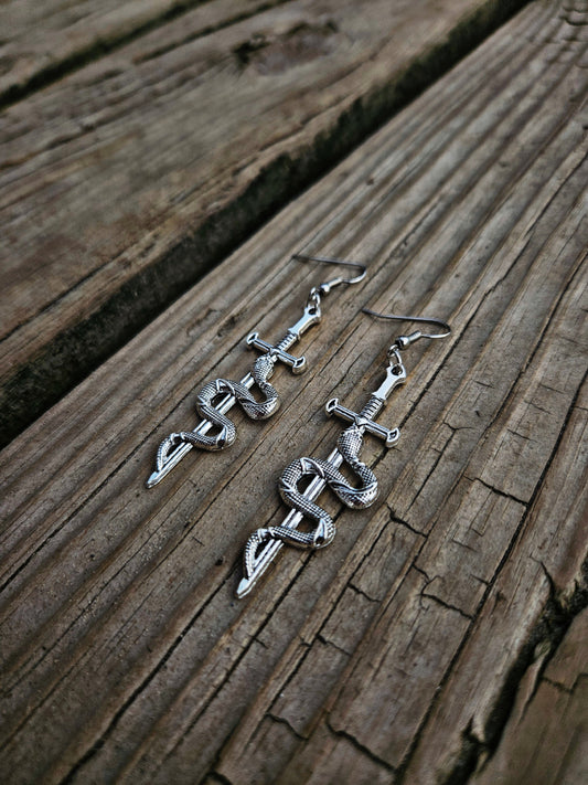 Silver snake/ sword earrings