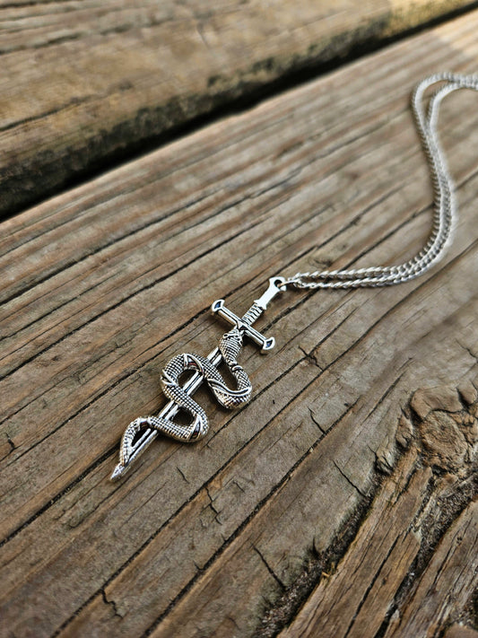Silver snake/sword necklace